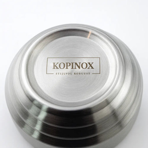 Een foto van de onderzijde van een dubbelwandige inox rijstkom